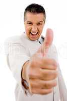 side view of successful businessman showing thumb up