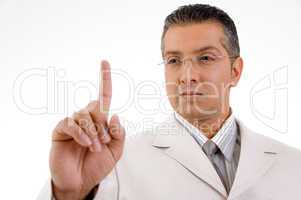 side view of smiling businessman looking his finger