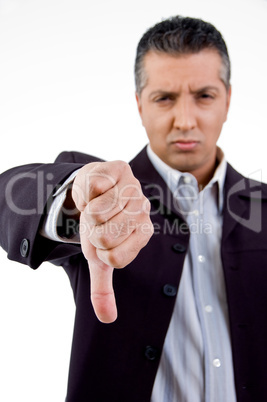 front view of unhappy boss showing thumb down