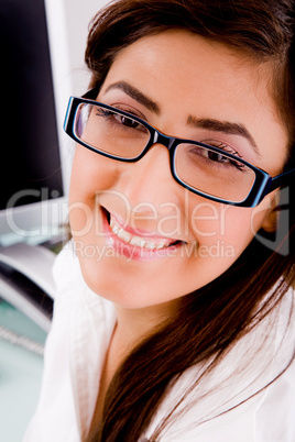 close view of smiling female with eyewear