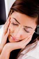 close view of tired woman with closed eyes