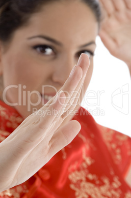 close up of woman showing karate gesture