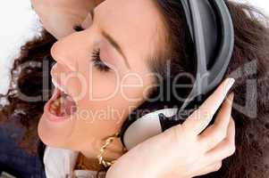 woman shouting while listening music