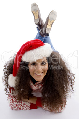 laying young female with christmas hat