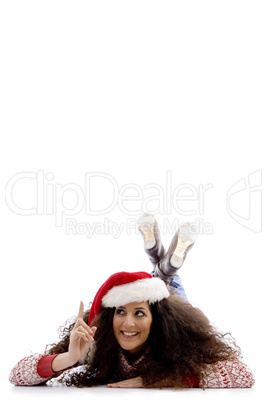 pointing female with christmas hat