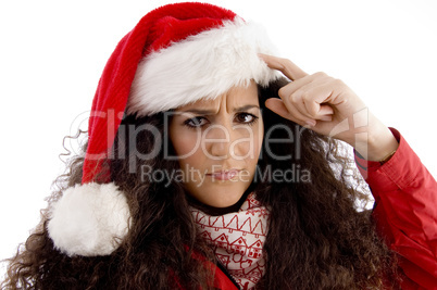 thinking young woman with christmas hat