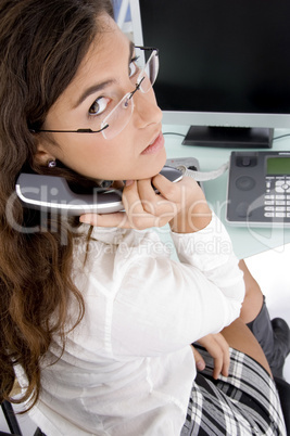 high angle view of woman holding receiver