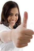 young cute girl showing thumbs up