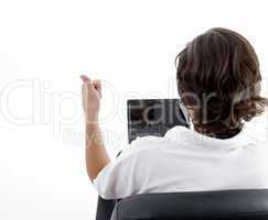 man busy with laptop and posing from back