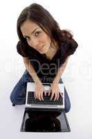 high angle view of young woman with laptop