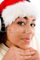 smiling female wearing red christmas hat