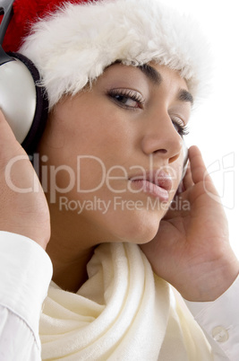 lovely young girl posing with christmas hat