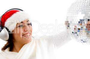 gorgeous girl with christmas hat and wearing headphones