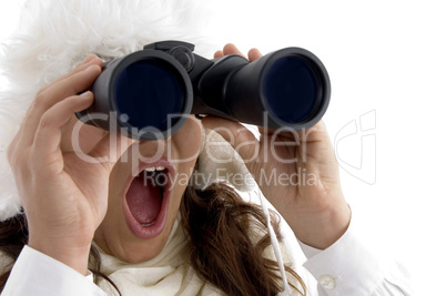 beautiful woman looking through binocular