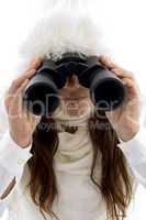 beautiful woman looking through binocular