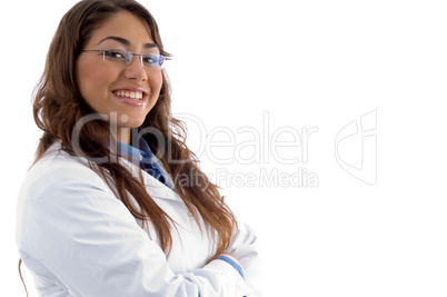 smiling doctor posing with folded arms