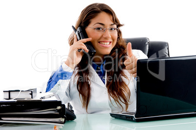 smiling doctor with thumbs up