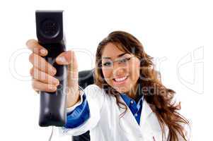 smiling doctor showing phone receiver