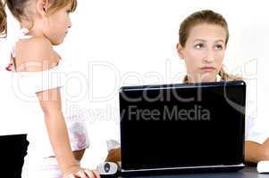 mother and daughter with laptop