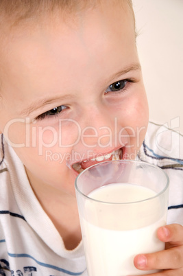 cute child with milk glass