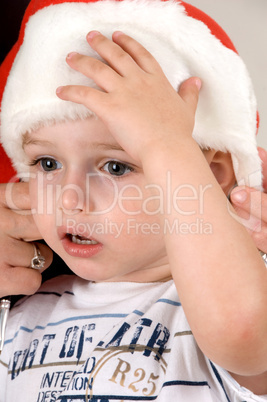 sweet baby with christmas hat