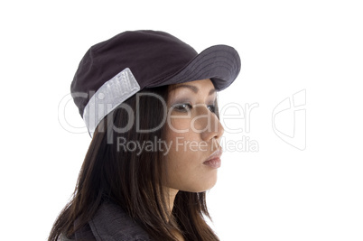 side pose of female wearing security cap