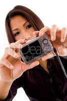 attractive woman holding camera