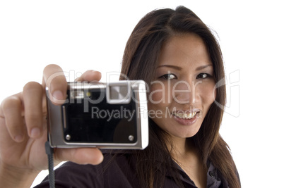 smiling female showing camera