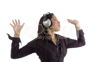 female enjoying music on headphone