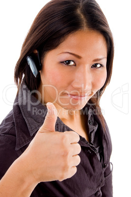 young female service with thumbs up wearing bluetooth