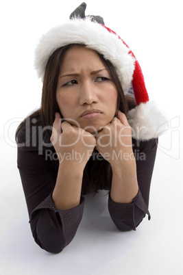 christmas hat wearing female in sad mood