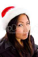 young female in christmas hat winking