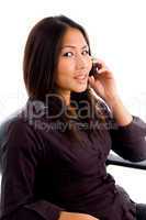 young female service provider busy on cell phone