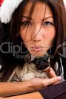 beautiful woman holding cute puppy