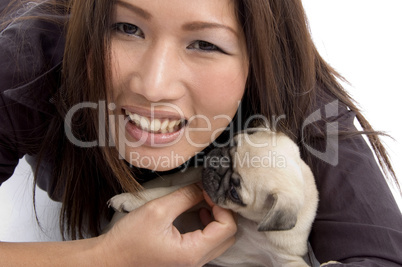 portrait of female with little puppy