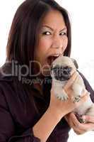 shouting female holding puppy