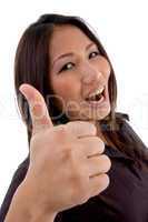 cheerful model with thumbs up