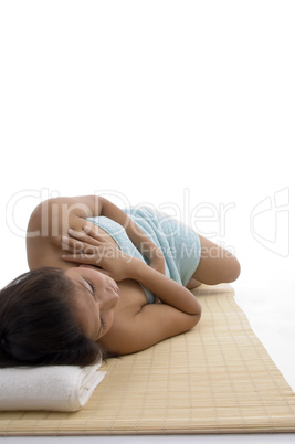 side view of young woman in relaxation pose