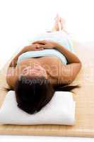 laying woman ready to take massage