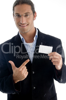 young good looking boss pointing towards business card
