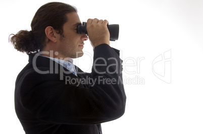 young caucasian service provider looking through binoculars