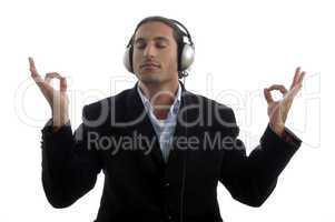 young american attorney listening music on headset