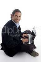 young good looking lawyer busy with laptop