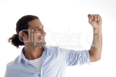 handsome model showing fist in air