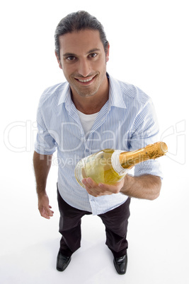 young handsome guy holding wine bottle