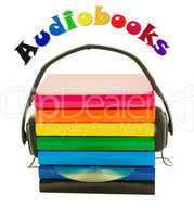 Stack of books and headphones - Audiobooks concept
