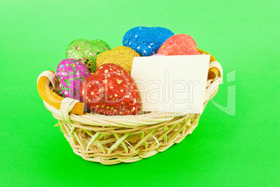 Basket full of the colorful heart shaped toys