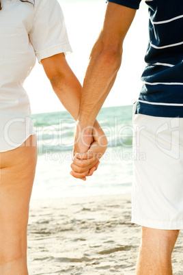Couple holding hands