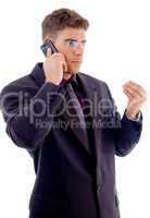 money - businessman busy with cell phone