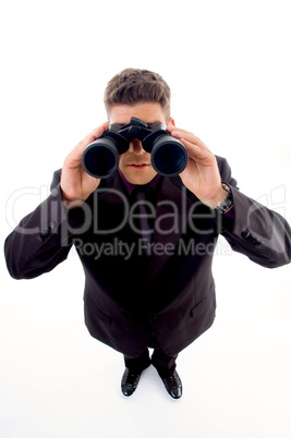 handsome young businessman with a pair of binoculars